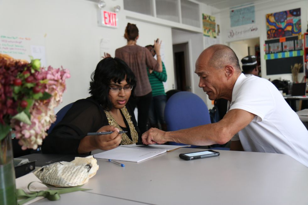 Monica Melton followed Don Kao, a Chinese American LGBT activist, around for weeks on an assignment from New York Times photo editor James Estrin. Melton captured this moment of Don helping a woman fill out paperwork. It exemplifies how hands on and willing to help Don is, especially among LGBTQ youth.