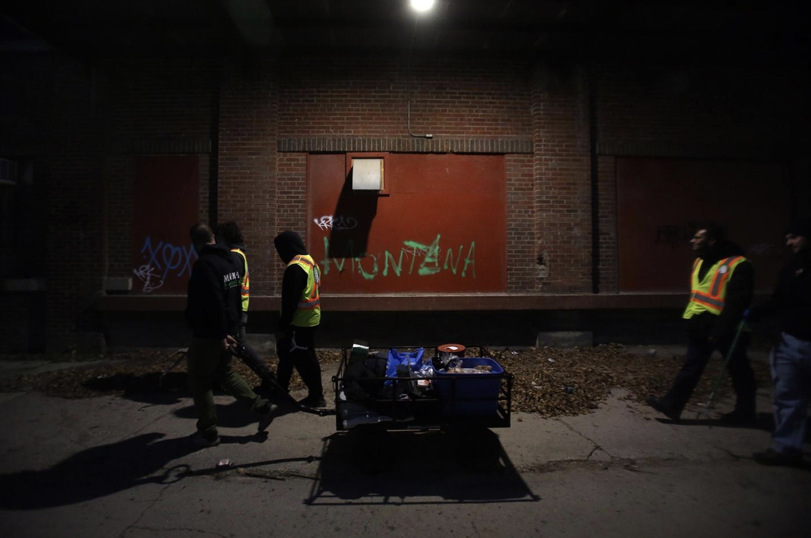 Patrols walking in alley near Winnipeg’s Main Street. 