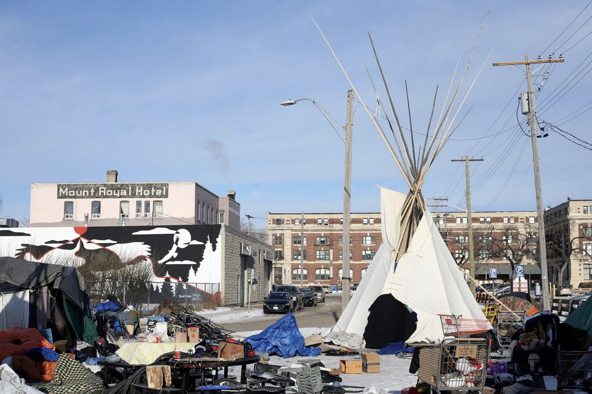 A camp used by unhoused individuals in Winnipeg in the winter of 2020, which was later demolished by city workers. 