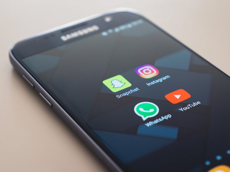 Phone screen with social media icons