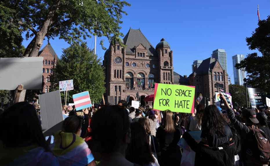 Pro-LGBTQ2S+ protestors demonstrated in front of Queens Park in Toronto, ON, on Sept. 20, countering a protest held by people seeking to roll back trans-inclusive policies organized as part of the “1 Million March 4 Children.”