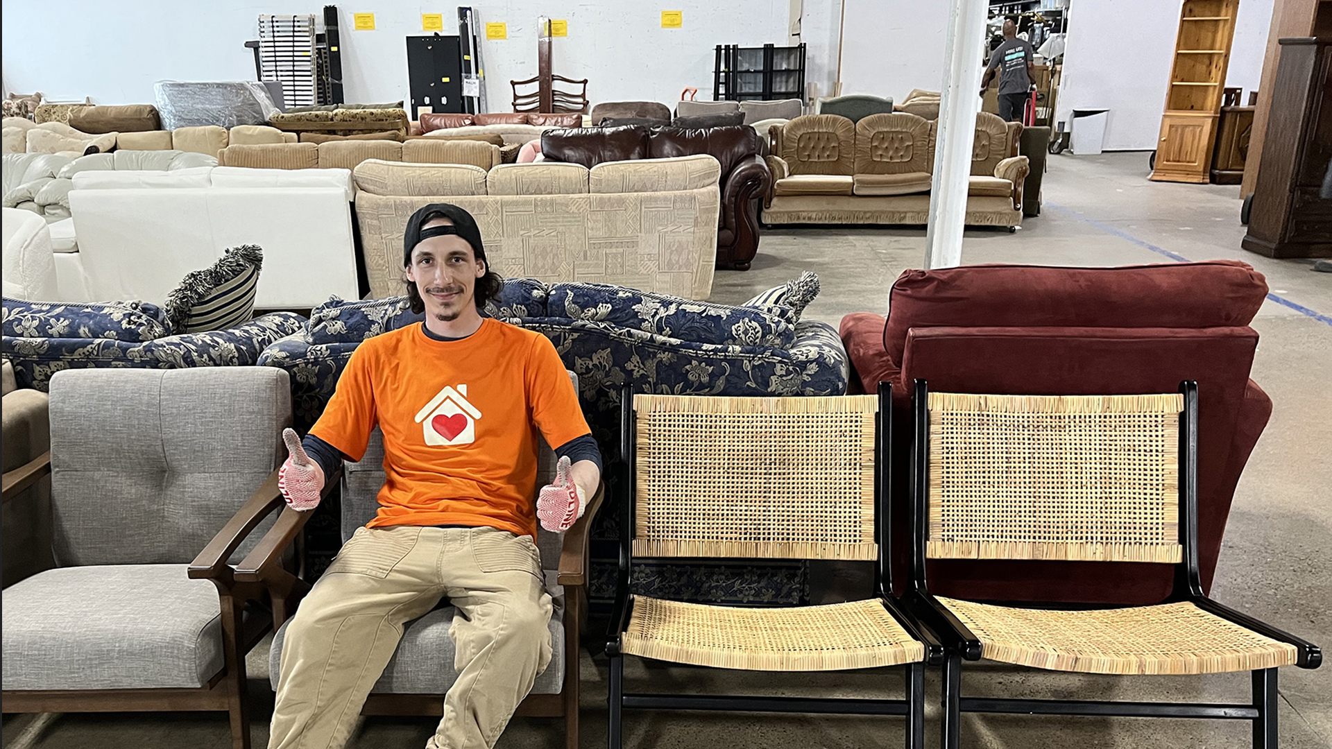 A CSJ employee at Furniture Bank in Etobicoke. 