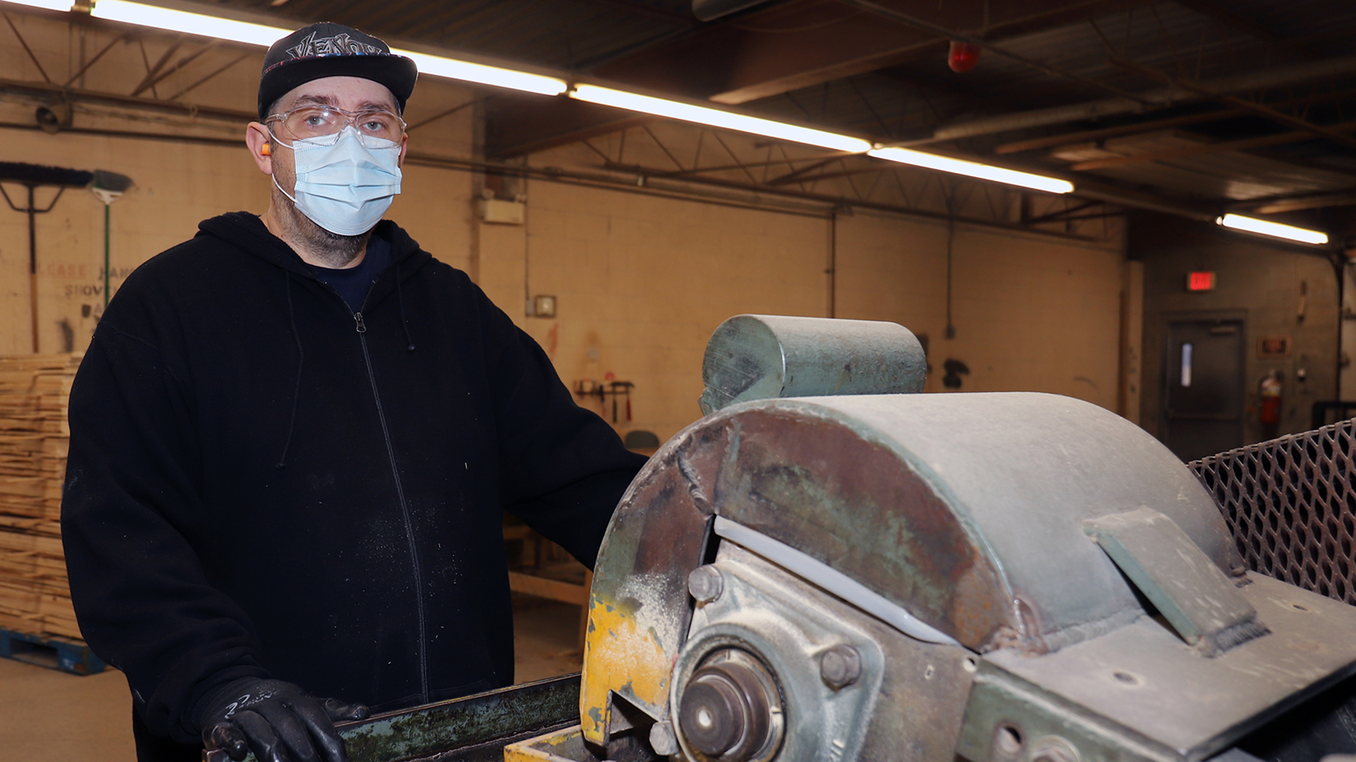 Stephen inside the pallet shop.
