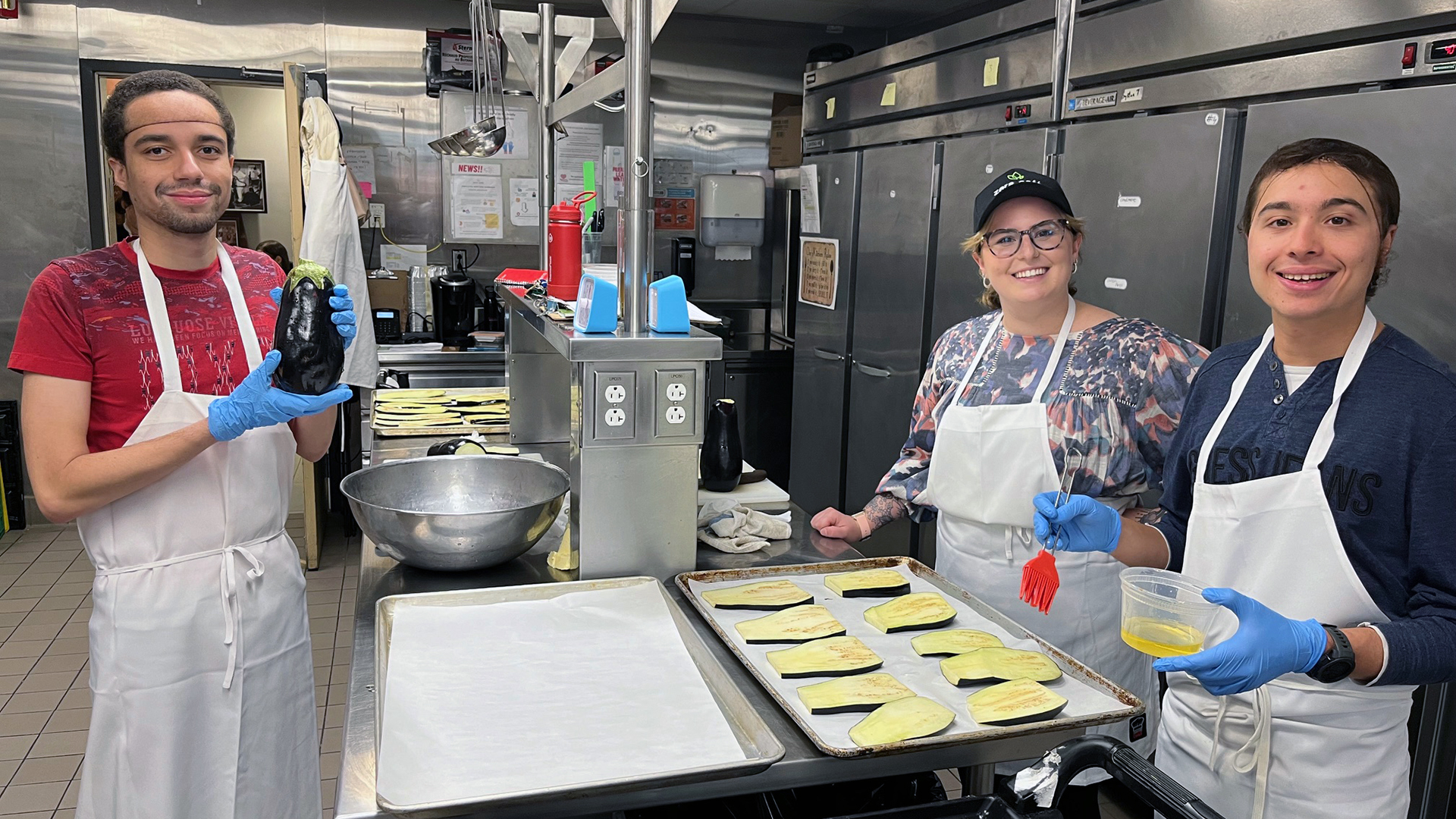 Julien Robin, lead job coach Lauren Richardson, and Adamo Morrone at the Zera Cafe.