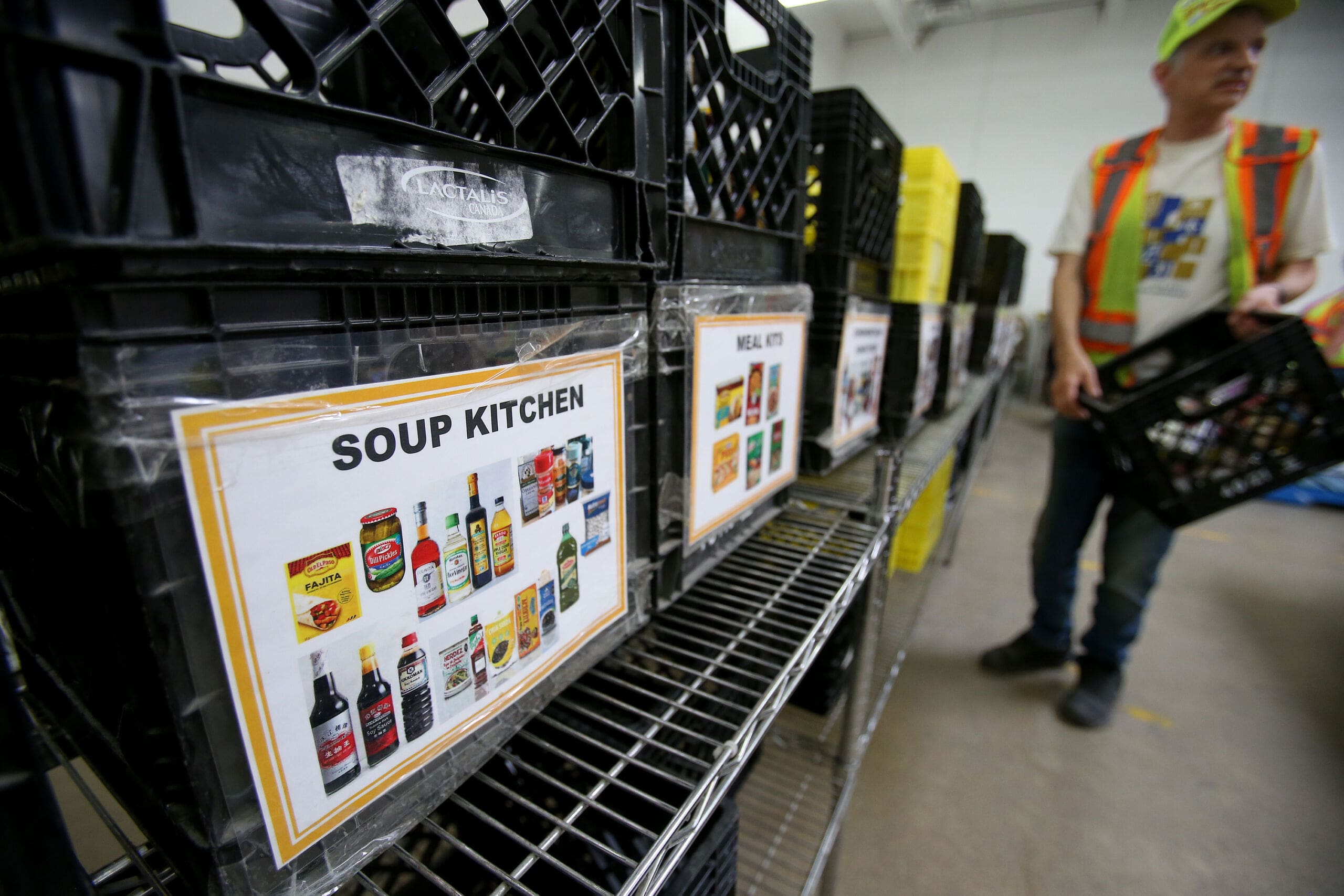 Volunteers sort donations at Harvest Manitoba. (Shannon VanRaes/Future of Good)